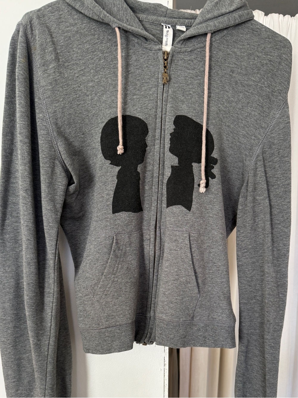 Gray Zip-Up Hoodie with Black Silhouette Graphic